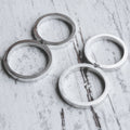Alianzas de boda corazón dividido en plata artesanal que encajan